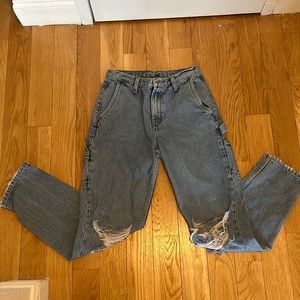 Carmar jeans w knee rips and side pocket detail